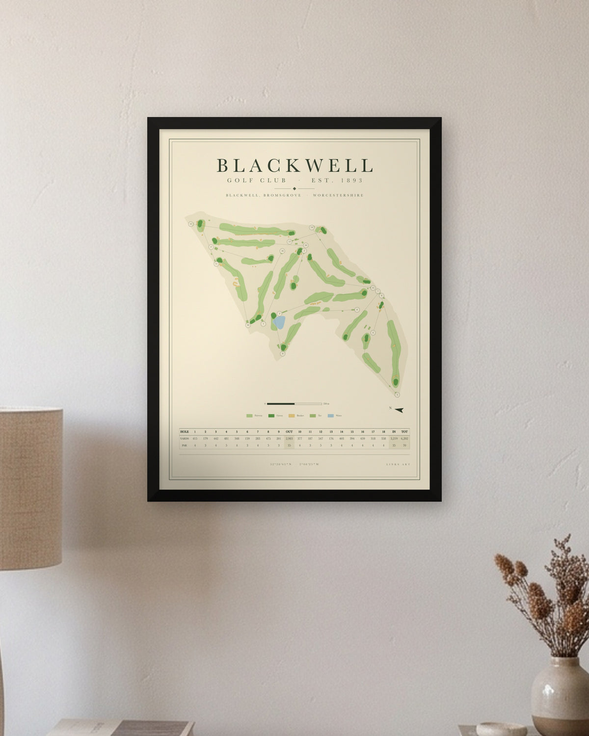 Blackwell golf course map print in a black frame, hung on a wall