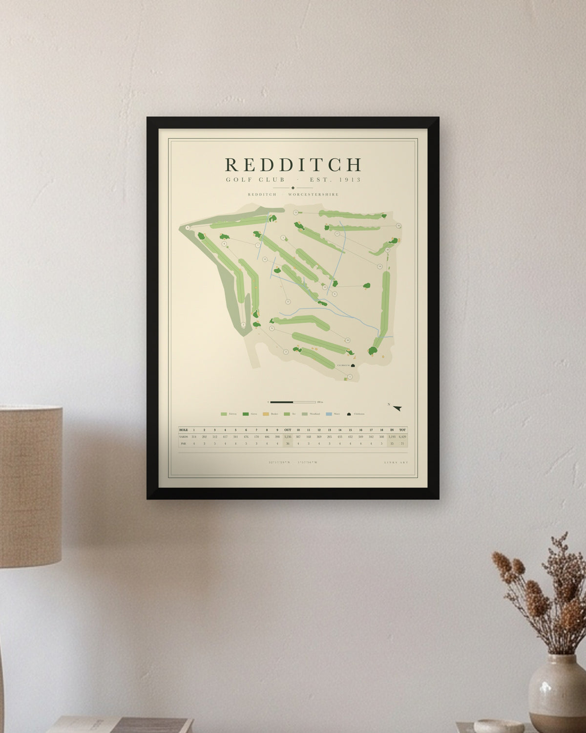 Redditch golf course map print in a black frame, hung on a wall