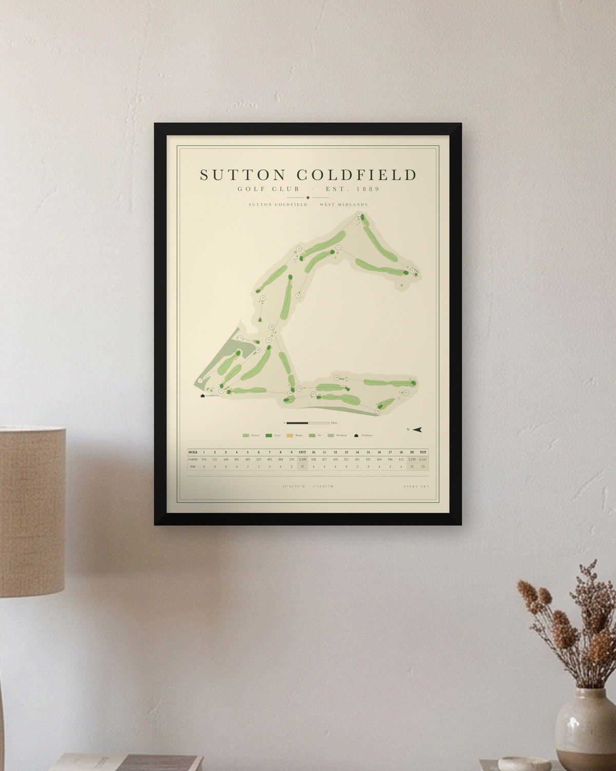 Sutton Coldfield golf course map print in a black frame, hung on a wall